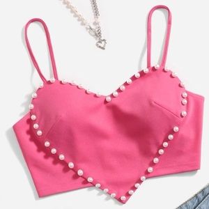 Pink tank. Pearl heart.